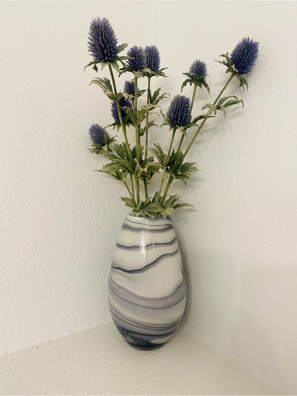 Elegant Gray Marble-Pattern Vase with Blue Thistle Stems